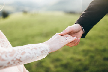 Beautiful bride and groom at the mountains