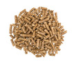 Top view of wood pellets in a small pile isolated on a white background.