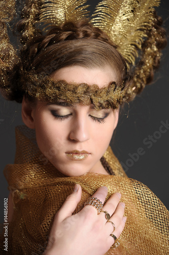 Golden lady Stock Photo | Adobe Stock