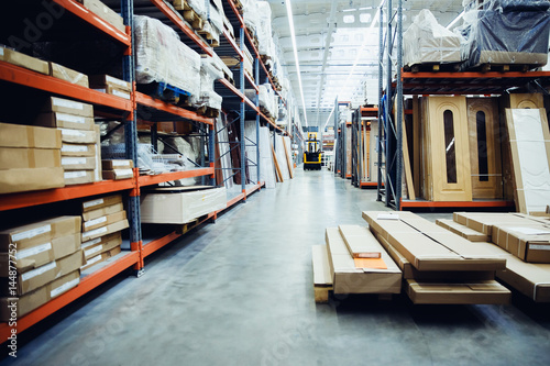 Fotografía Shelf with structural materials on the shelves in the construction warehouse