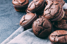 Chocolate Muffins On A Dark Background