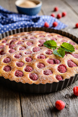 Wall Mural - Juicy raspberry pie with powdered sugar icing