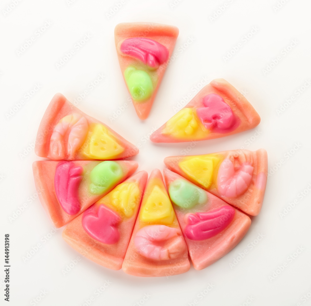 Composition of tasty jelly candies on white background