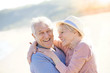 © goodluz - Portrait of senior couple at the beach