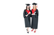 © LIGHTFIELD STUDIOS - Two beautiful young students in academic caps holding diplomas and smiling at camera