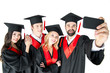© LIGHTFIELD STUDIOS - young happy students taking selfie on smartphone isolated on white