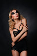 © Prostock-studio - Fashion model in black underwear with art make-up