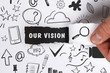 © Egor - Business, Technology, Internet and network concept. Young businessman shows the word: Our vision