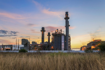 Wall Mural - Gas turbine electrical power plant at dusk with twilight