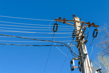 Electricity concrete pole with electrical connections cable and high voltage isolators