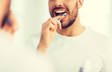 Poster - close up of man with toothbrush cleaning teeth