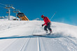 © Аrtranq - man with special ski equipment is riding very fast in the mountain hill