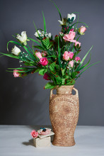 Spring Flowers In A Vase On Grey Background