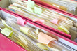 messy file folders and documents,close up, selective focus