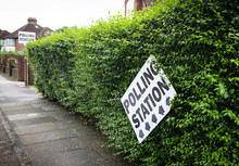Polling Station Sign And Union Jack Flag - UK Prepares For Elections