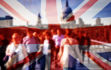 union jack flag and people walking on Millenium bridge in the background, London - UK prepares for elections after Brexit