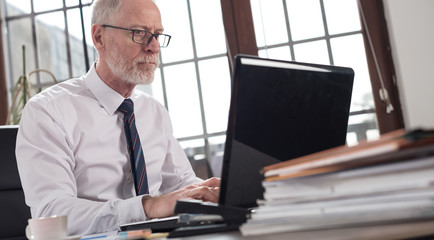 Businessman working on laptop