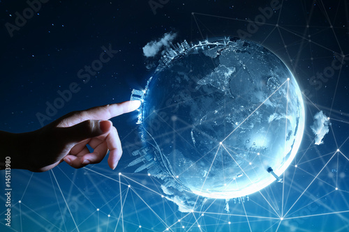 Fotografia Man touching Abstract global with wireless communication network on space backgr