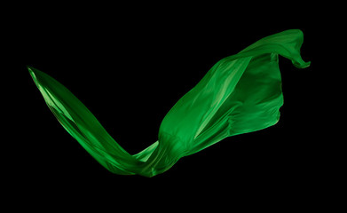 Wall Mural - Smooth elegant green cloth on black background
