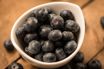 Wall Mural - Blueberry Honey with blueberries and liquid honey in jar