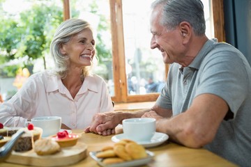 Senior couple interacting with each other