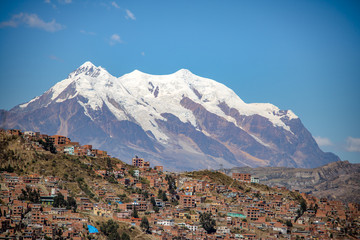 Wall Mural - Aerial view of La Paz with Illimani Mountain on background - La Paz, Bolivia