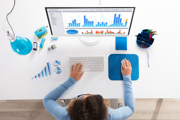 Poster - Businesswoman Analyzing Graph