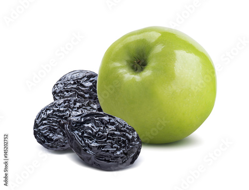 Stampe Whole green apple back and dry plums isolated