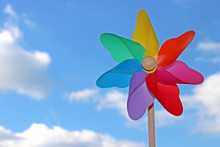 Colorful Pinwheel, Sky With White Clouds