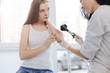© zinkevych - Concerned young girl having dermatology appointment in the hospital