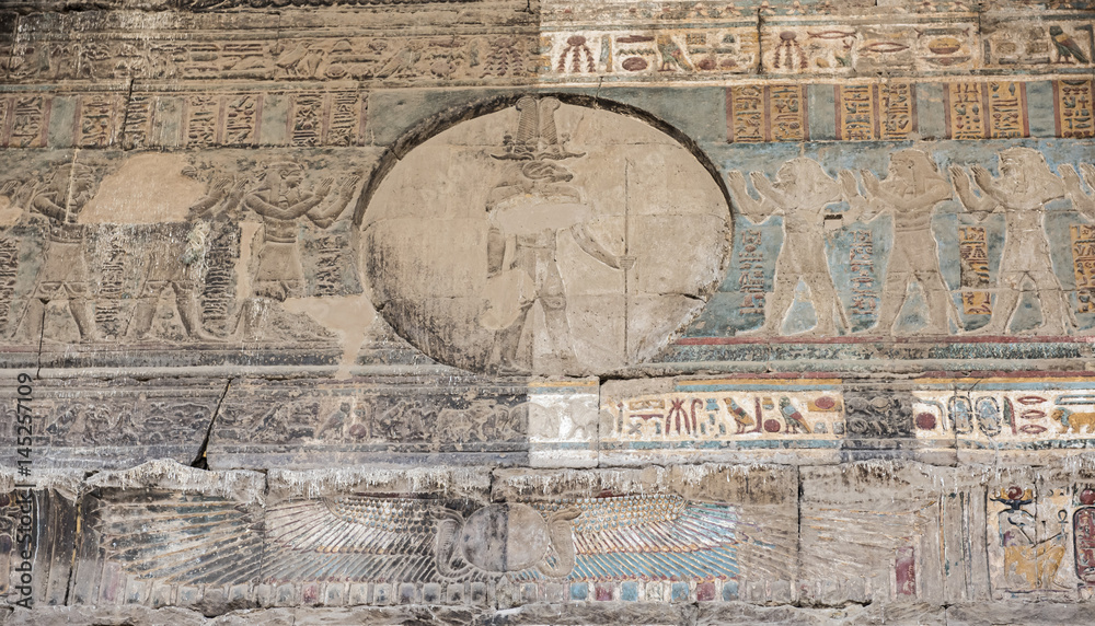 Hieroglyphic carvings on an ancient egyptian temple wall Stock Photo