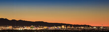 Colorful Sunset Over Las Vegas, NV Cityscape With City Lights
