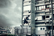 © Coka - young man doing parkour in the city