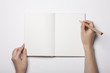© dohee - woman hand hold a book(note) isolated white.