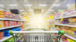 © nonnie192 - Supermarket aisle with empty green shopping cart
