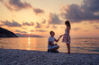 © ASTA Concept - Romantic marriage proposal on the beach