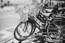 Black And White Travel Bicycle For Rent In Urban. Vintage Color Effect