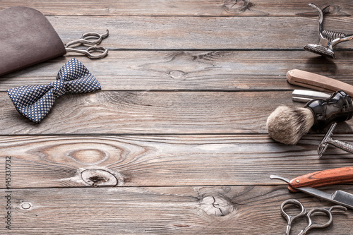 Fotografie, Obraz Vintage barber shop tools on wooden background