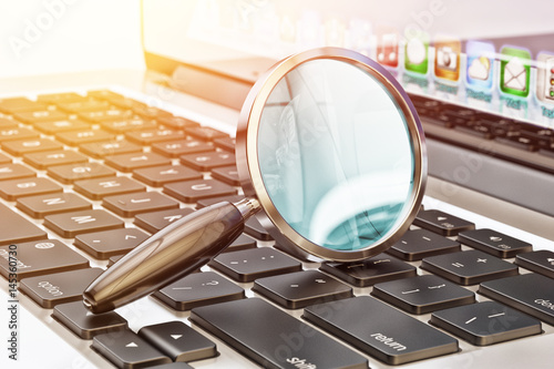 Fotomural Data search technology concept, magnifying glass on laptop computer keyboard clo