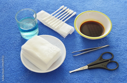 Fotografía first aid kits for basic cleaning injury wound on blue table
