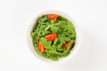 Sticker - arugula and tomato salad