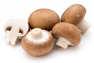 Wall Mural - Fresh champignon mushrooms isolated on white.