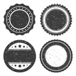 Four different grunge badge template, black scratched circle stamp old styled.