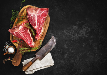 Wall Mural - Raw dry aged t-bone steaks for grill