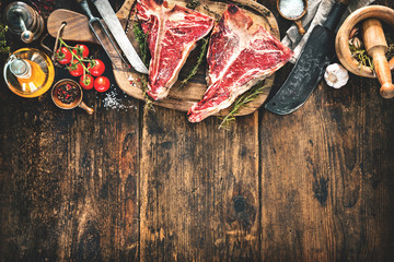 Wall Mural - Raw dry aged t-bone steaks for grill