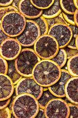 Wall Mural - Background citrus ripe juicy slices of orange lemon shot close-up 