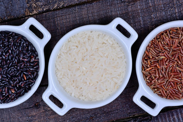 Poster - Rice in a ceramic bowls on table