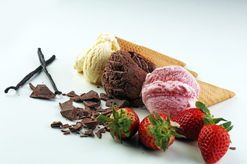 three scoops of ice cream - vanilla, strawberry and chocolate