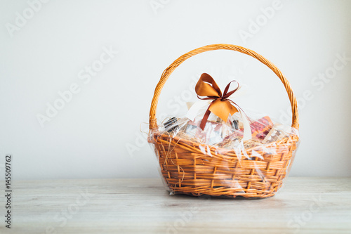 Fotografía  gift basket on grey background