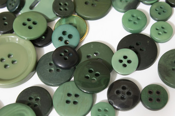 Green sewing buttons background